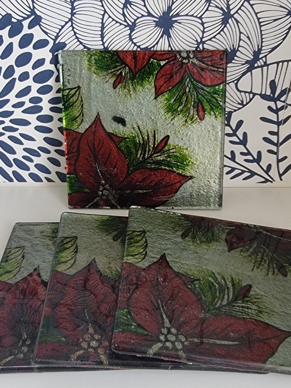 Set of 4 glass Christmas coasters, Poinsettia pattern; festive season